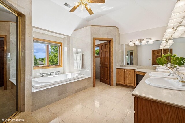 3 Shoreside Dr, South Barrington, IL 60010 - bathroom with lofted ceiling, a bath, double vanity, ceiling fan, and tile patterned flooring