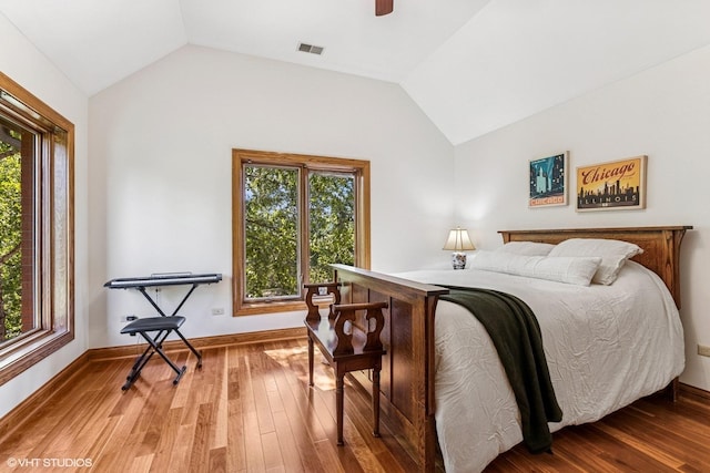 3 Shoreside Dr, South Barrington, IL 60010 - bedroom with lofted ceiling, wood finished floors, and ceiling fan