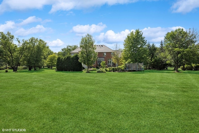 3 Shoreside Dr, South Barrington, IL 60010 - view of green lawn with a trampoline