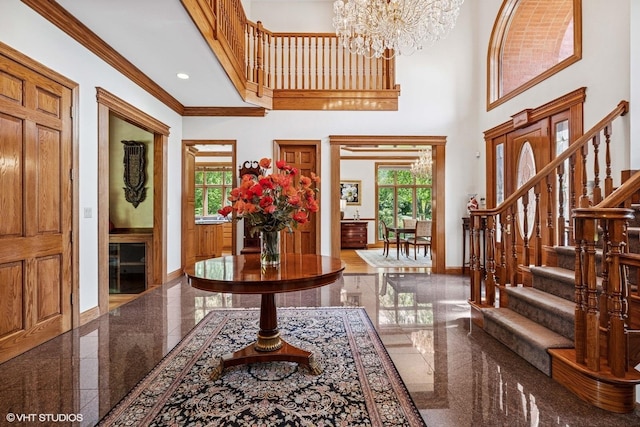3 Shoreside Dr, South Barrington, IL 60010 - foyer entrance with granite tiled floors, plenty of natural light, a high ceiling, a chandelier, and stairway