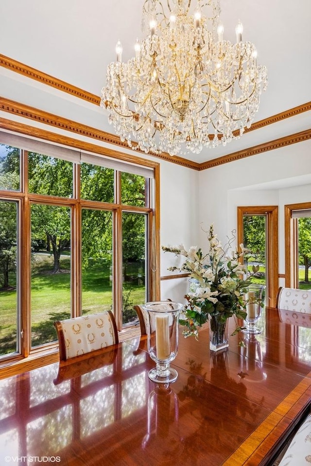 3 Shoreside Dr, South Barrington, IL 60010 - dining area with a chandelier and ornamental molding