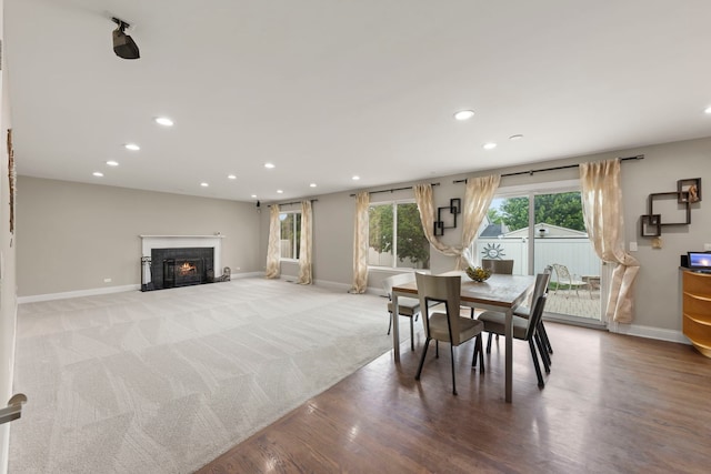1462 Haversham Dr, Aurora, IL 60502 - dining space with recessed lighting, baseboards, a lit fireplace, and light wood finished floors