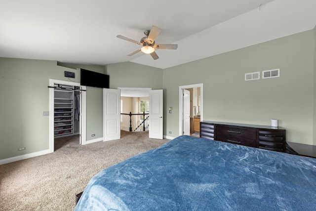 1462 Haversham Dr, Aurora, IL 60502 - bedroom with vaulted ceiling, carpet floors, baseboards, a ceiling fan, and ensuite bathroom