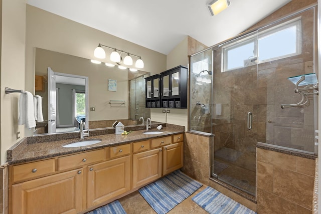 1462 Haversham Dr, Aurora, IL 60502 - bathroom featuring healthy amount of natural light, a shower stall, double vanity, and tile patterned floors