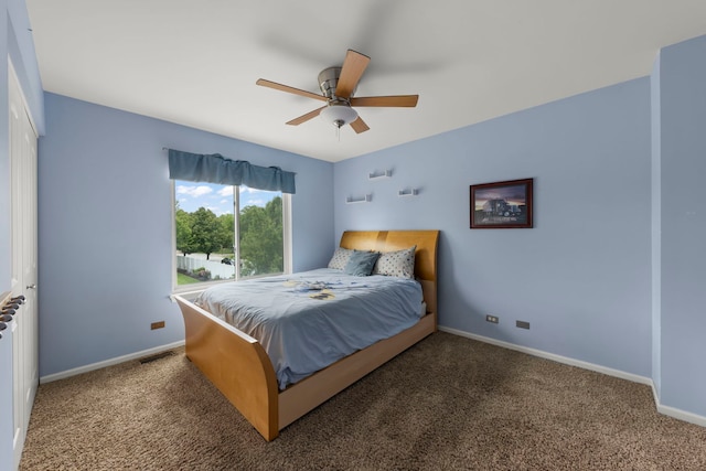 1462 Haversham Dr, Aurora, IL 60502 - bedroom featuring carpet floors, baseboards, and a ceiling fan