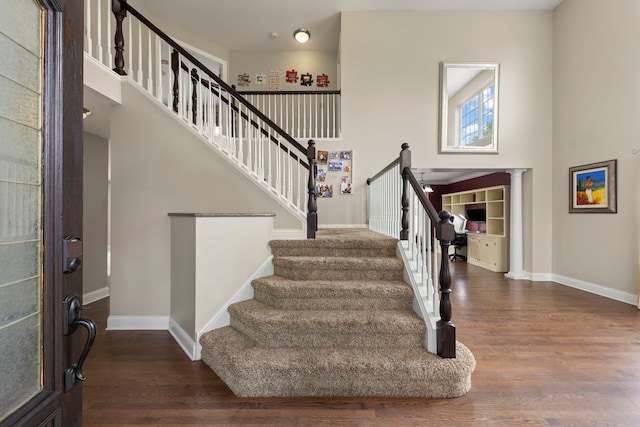 1462 Haversham Dr, Aurora, IL 60502 - entrance foyer featuring wood finished floors, baseboards, stairway, and a towering ceiling