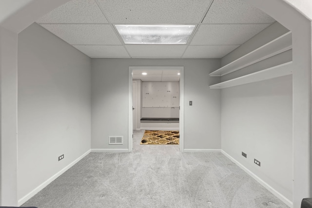 1462 Haversham Dr, Aurora, IL 60502 - unfurnished room with a drop ceiling, carpet, baseboards, recessed lighting, and arched walkways