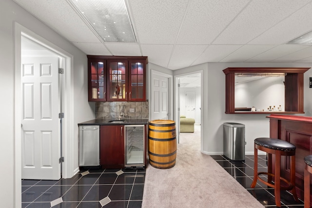 1462 Haversham Dr, Aurora, IL 60502 - indoor bar featuring wine cooler, a drop ceiling, dark tile patterned flooring, backsplash, and baseboards