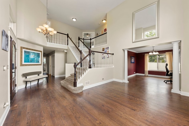1462 Haversham Dr, Aurora, IL 60502 - entrance foyer featuring a chandelier, a towering ceiling, wood finished floors, stairway, and baseboards