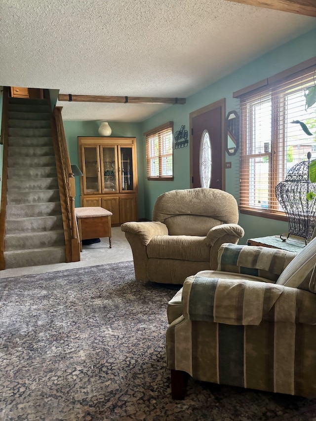 5116 154th St, Oak Forest, IL 60452 - living area featuring a textured ceiling, carpet, and stairs