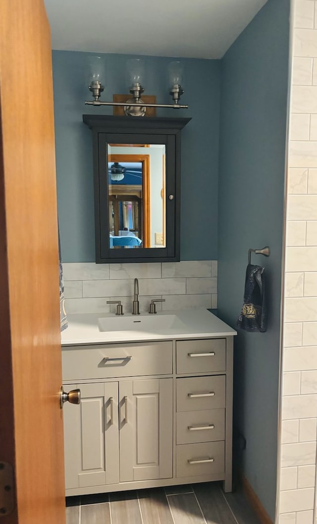 5116 154th St, Oak Forest, IL 60452 - bathroom featuring vanity, decorative backsplash, and tile patterned floors