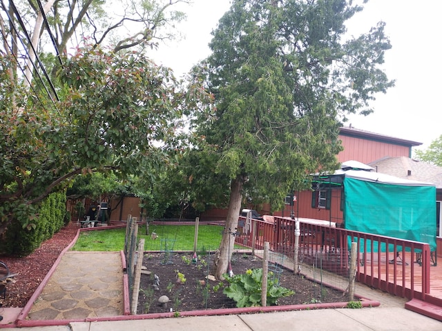 5116 154th St, Oak Forest, IL 60452 - view of yard with a wooden deck and a garden