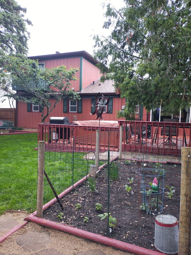 5116 154th St, Oak Forest, IL 60452 - view of grassy yard with a garden and a wooden deck