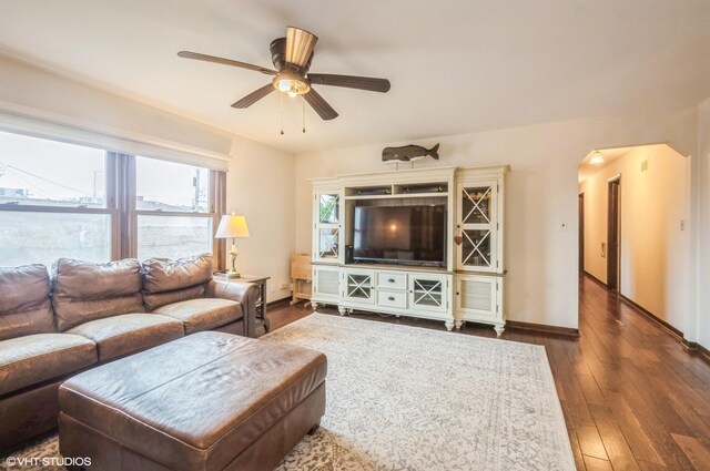 5639 W Montrose Ave, Chicago, IL 60634 - living room with a ceiling fan, dark wood-type flooring, and baseboards