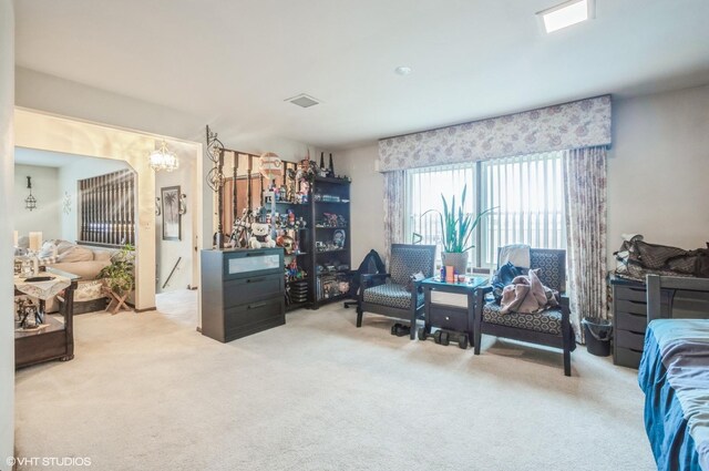 5639 W Montrose Ave, Chicago, IL 60634 - bedroom featuring carpet and a chandelier