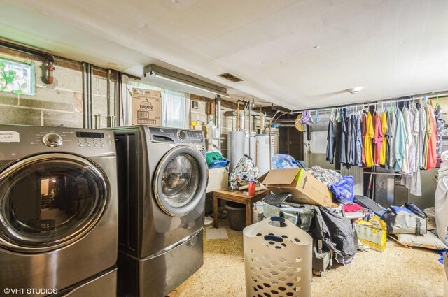 5639 W Montrose Ave, Chicago, IL 60634 - washroom featuring washer and dryer and water heater