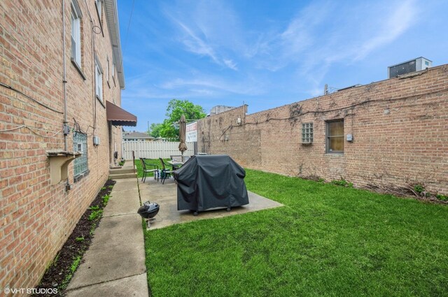 5639 W Montrose Ave, Chicago, IL 60634 - view of yard featuring a patio area