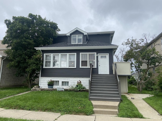 6432 41st St, Stickney, IL 60402 - bungalow-style house with a front lawn and roof with shingles