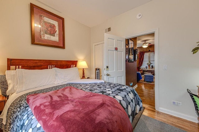 5942 S King Dr Unit 2N, Chicago, IL 60637 - bedroom featuring wood finished floors and baseboards
