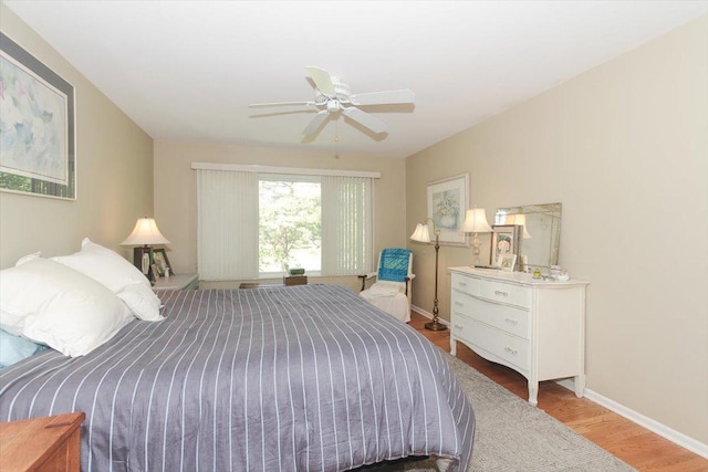 196 Shoreline Rd, Lake Barrington, IL 60010 - bedroom featuring wood finished floors, a ceiling fan, and baseboards