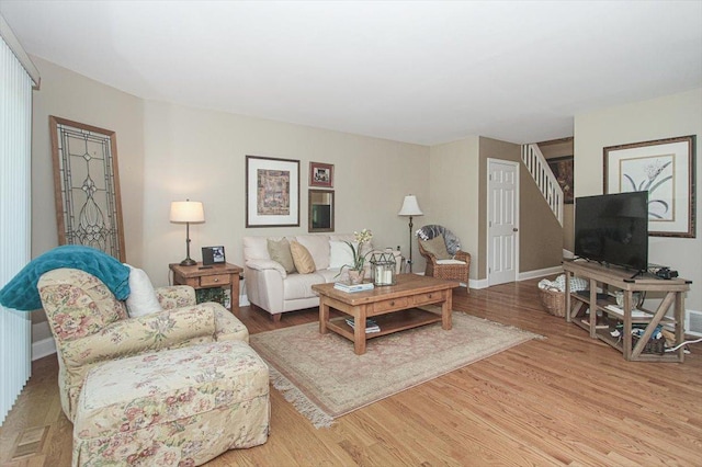 196 Shoreline Rd, Lake Barrington, IL 60010 - living room with wood finished floors, stairs, and baseboards