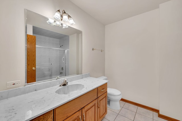 1212 Ashford Ln, Joliet, IL 60431 - bathroom with a shower with door, vanity, toilet, tile patterned floors, and baseboards