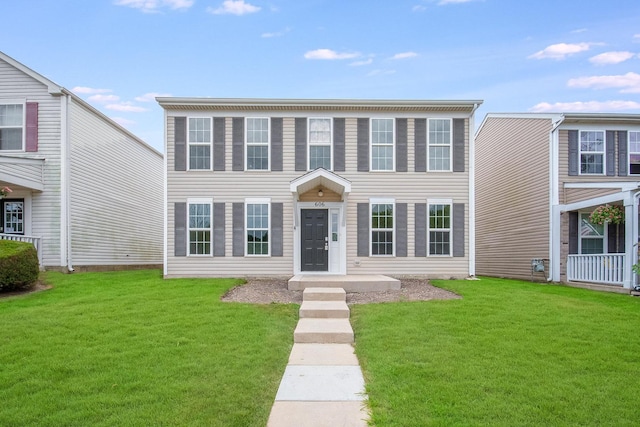 606 Four Seasons Blvd, Aurora, IL 60504 - view of front facade featuring a front yard