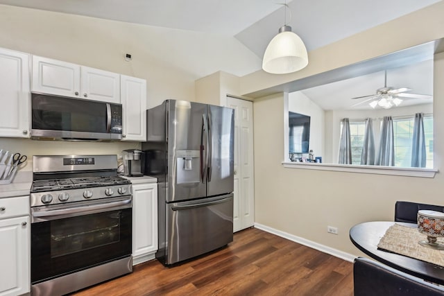 415 Hidden Creek Ln Unit 415, North Aurora, IL 60542 - kitchen with stainless steel appliances, white cabinets, dark wood-type flooring, baseboards, and vaulted ceiling