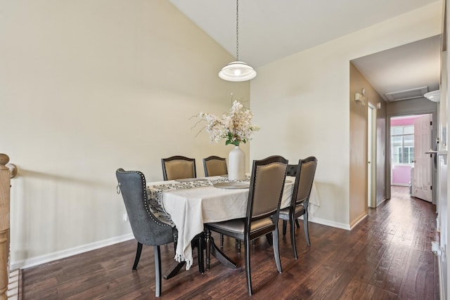 415 Hidden Creek Ln Unit 415, North Aurora, IL 60542 - dining space featuring wood finished floors, baseboards, and vaulted ceiling