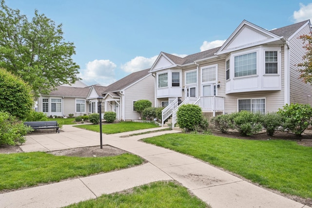 415 Hidden Creek Ln Unit 415, North Aurora, IL 60542 - view of community featuring a yard