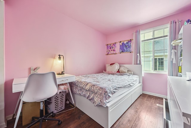 415 Hidden Creek Ln Unit 415, North Aurora, IL 60542 - bedroom featuring wood finished floors, baseboards, and an office area