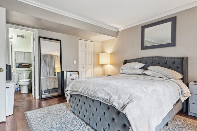 415 Hidden Creek Ln Unit 415, North Aurora, IL 60542 - bedroom with ornamental molding, wood finished floors, a closet, and ensuite bath