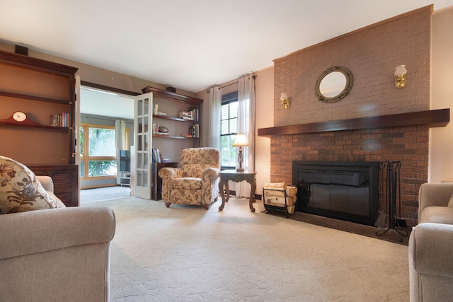 39270 N Lake Ave, Lake Villa, IL 60046 - living room featuring carpet and a brick fireplace