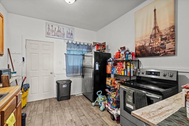 3823 W Wabansia Ave, Chicago, IL 60647 - kitchen with stainless steel appliances and wood finished floors