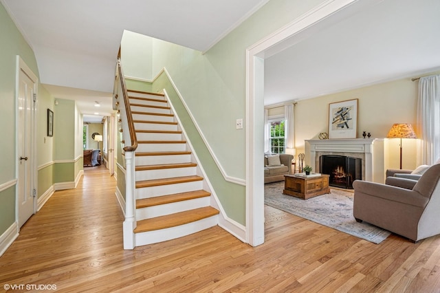 1117 Keystone Ave, River Forest, IL 60305 - stairs with wood finished floors, a high end fireplace, and baseboards