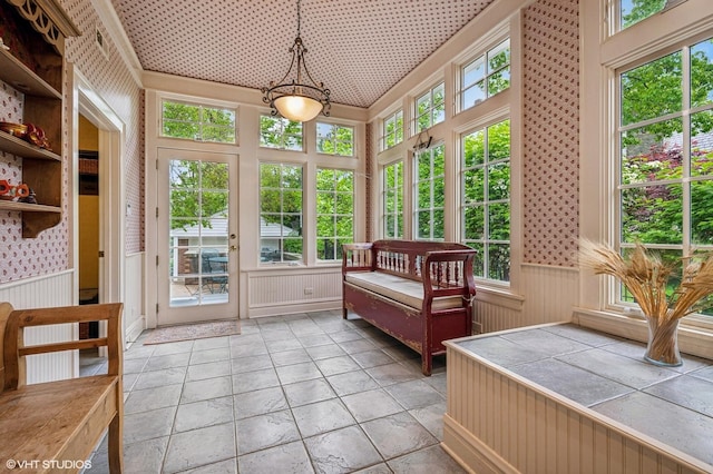 1117 Keystone Ave, River Forest, IL 60305 - sunroom with wainscoting, plenty of natural light, and stone finish flooring