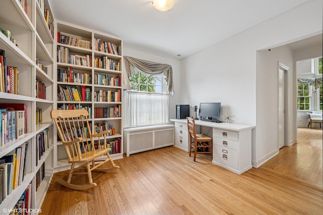 1117 Keystone Ave, River Forest, IL 60305 - home office featuring hardwood / wood-style floors, healthy amount of natural light, and radiator heating unit