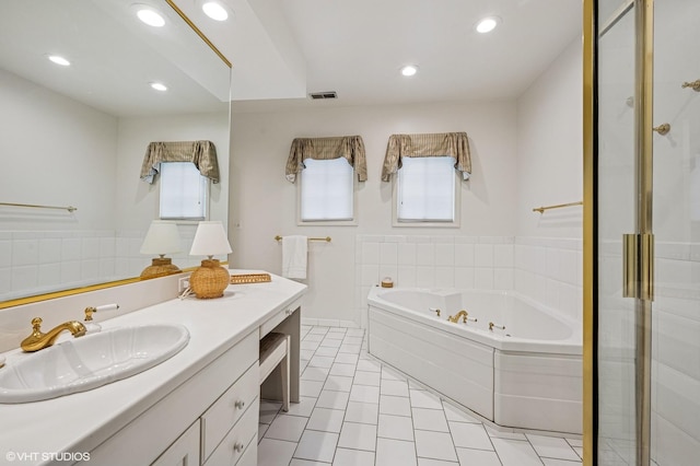 1117 Keystone Ave, River Forest, IL 60305 - full bathroom with a whirlpool tub, vanity, tile patterned flooring, and recessed lighting
