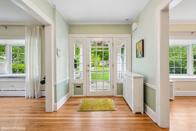 1117 Keystone Ave, River Forest, IL 60305 - foyer entrance featuring healthy amount of natural light, wood finished floors, baseboards, and crown molding