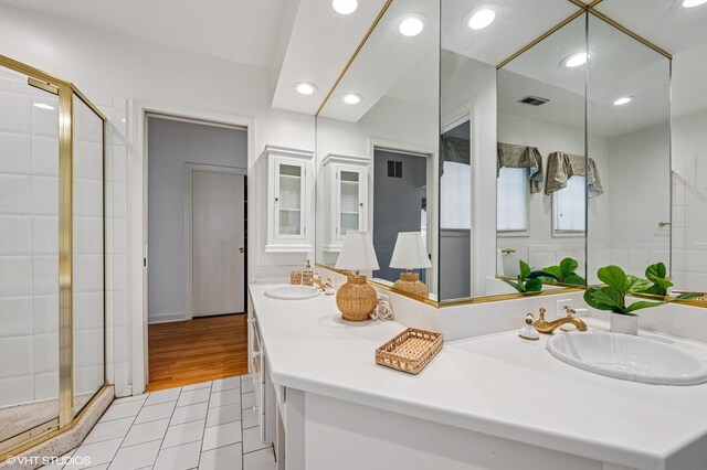1117 Keystone Ave, River Forest, IL 60305 - full bathroom with a shower stall, double vanity, recessed lighting, and wood finished floors