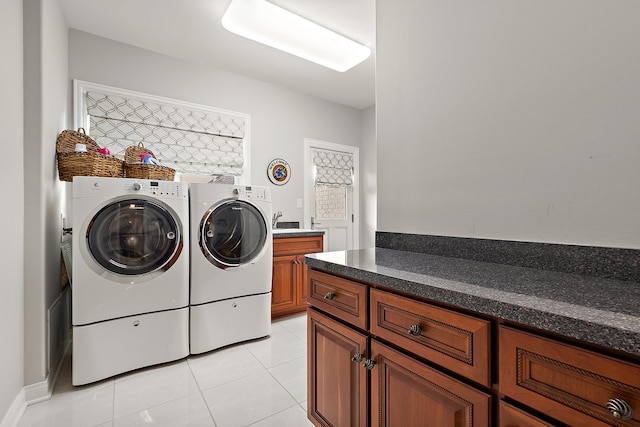 21186 Sage Brush Ln, Mokena, IL 60448 - laundry area featuring cabinet space, washer and clothes dryer, and light tile patterned floors