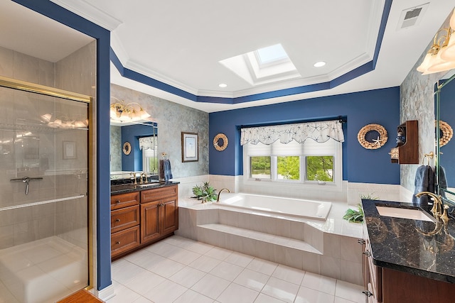 21186 Sage Brush Ln, Mokena, IL 60448 - full bath featuring a skylight, ornamental molding, two vanities, a garden tub, and a stall shower