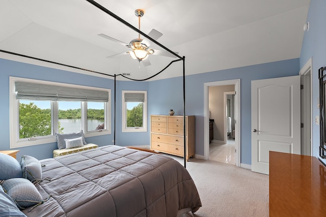 21186 Sage Brush Ln, Mokena, IL 60448 - bedroom with light colored carpet, baseboards, a water view, and a ceiling fan