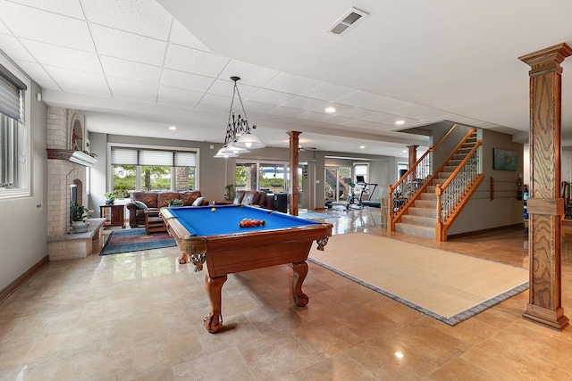 21186 Sage Brush Ln, Mokena, IL 60448 - playroom featuring decorative columns, billiards table, baseboards, a brick fireplace, and a drop ceiling