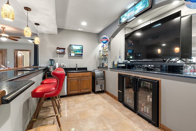 21186 Sage Brush Ln, Mokena, IL 60448 - indoor wet bar with wine cooler, ceiling fan, decorative light fixtures, baseboards, and recessed lighting