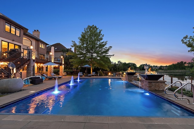 21186 Sage Brush Ln, Mokena, IL 60448 - pool at dusk with a patio and a water view