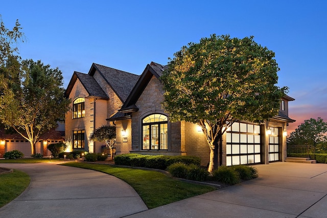 21186 Sage Brush Ln, Mokena, IL 60448 - french provincial home featuring concrete driveway and stone siding
