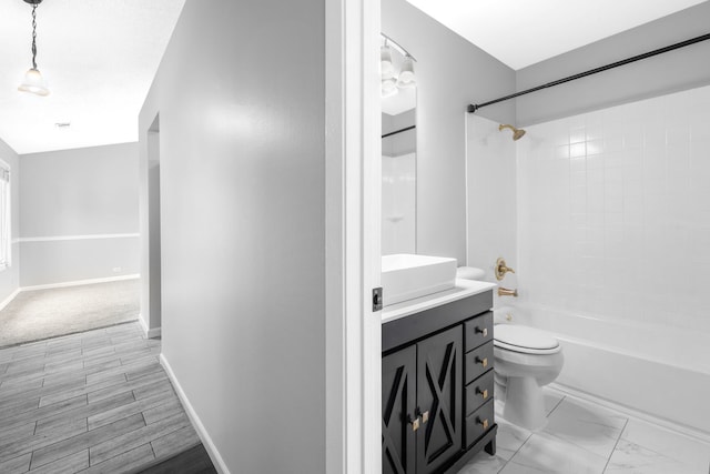 828 Huron Ct, Carol Stream, IL 60188 - bathroom featuring toilet, shower / bathtub combination, vanity, and baseboards