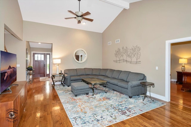 1233 Prairie Ln, Lemont, IL 60439 - living area featuring high vaulted ceiling, wood finished floors, ceiling fan, baseboards, and beam ceiling