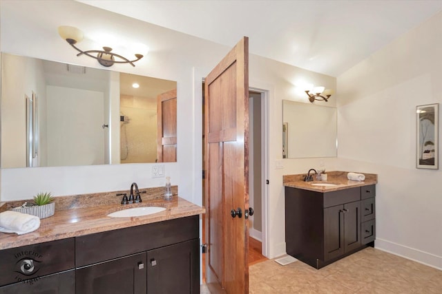1233 Prairie Ln, Lemont, IL 60439 - full bath featuring two vanities, baseboards, and tile patterned floors